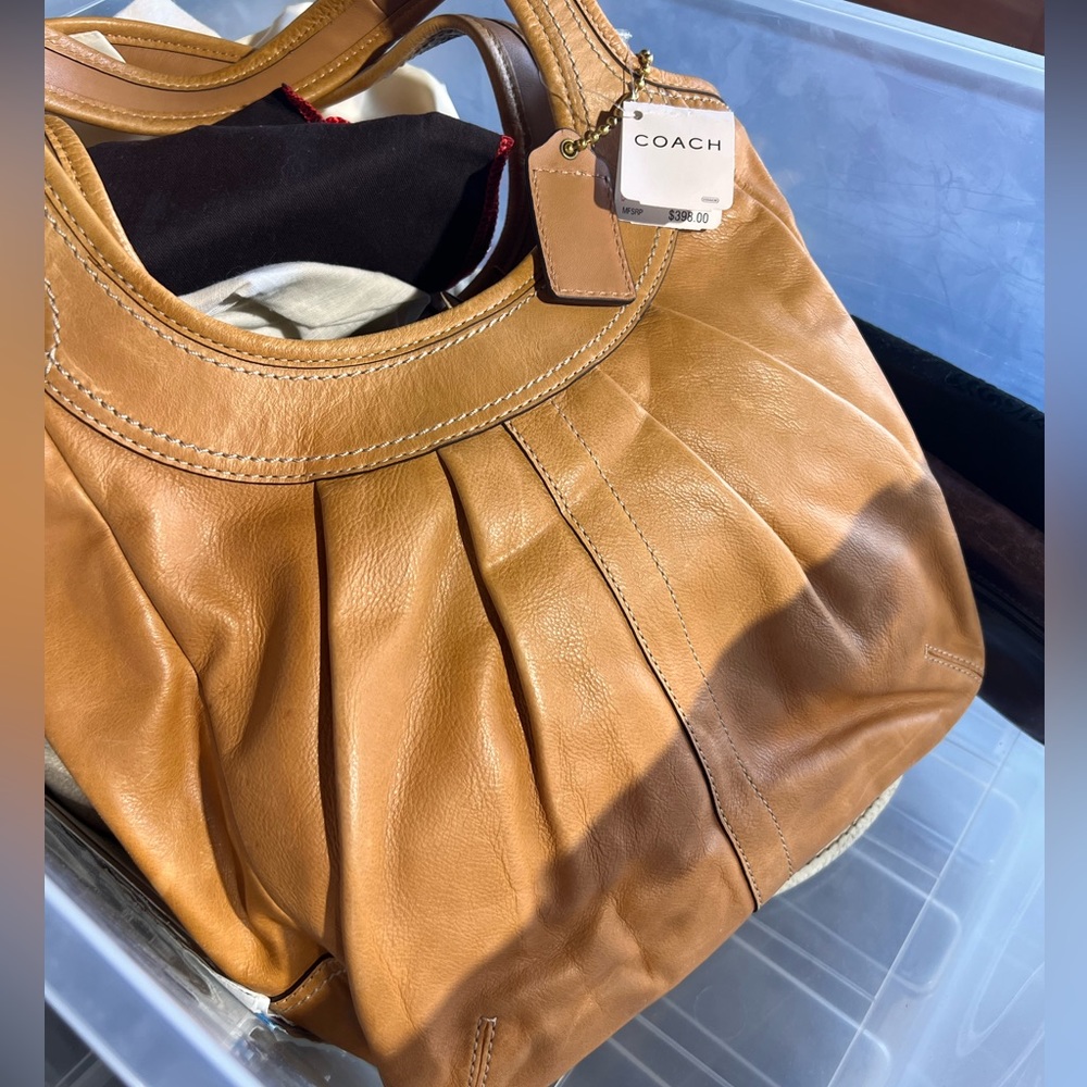 Coach purse, never used tags still on it.